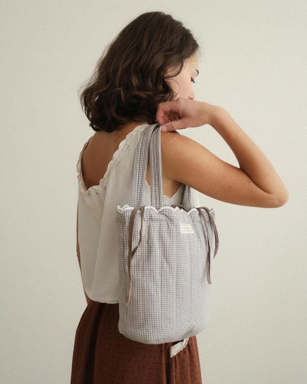 Dalaga Bag — quilted cotton gingham tote with scalloped edge and drawstring lining, ethically made in India.