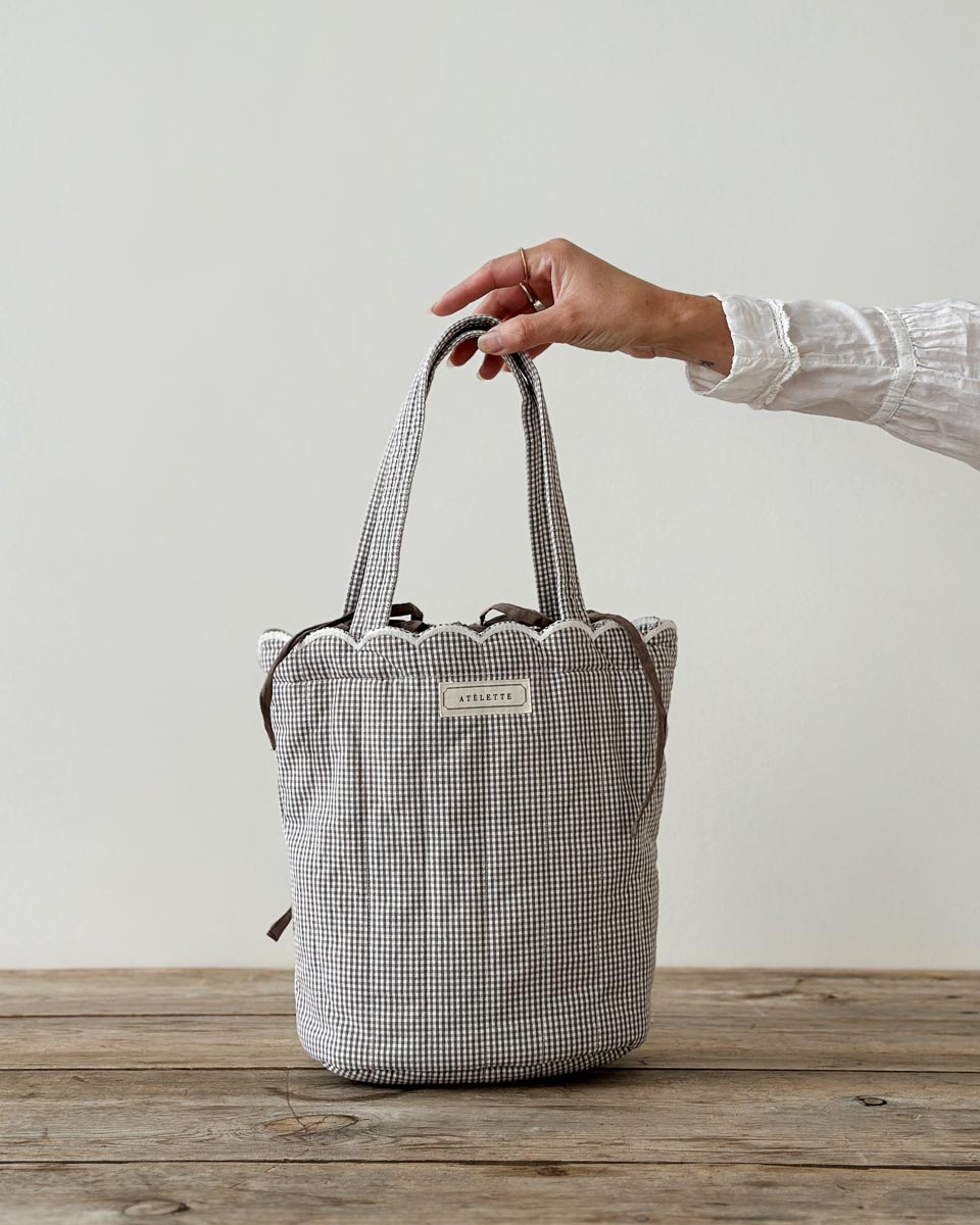 Dalaga Bag — quilted cotton gingham tote with scalloped edge and drawstring lining, ethically made in India.