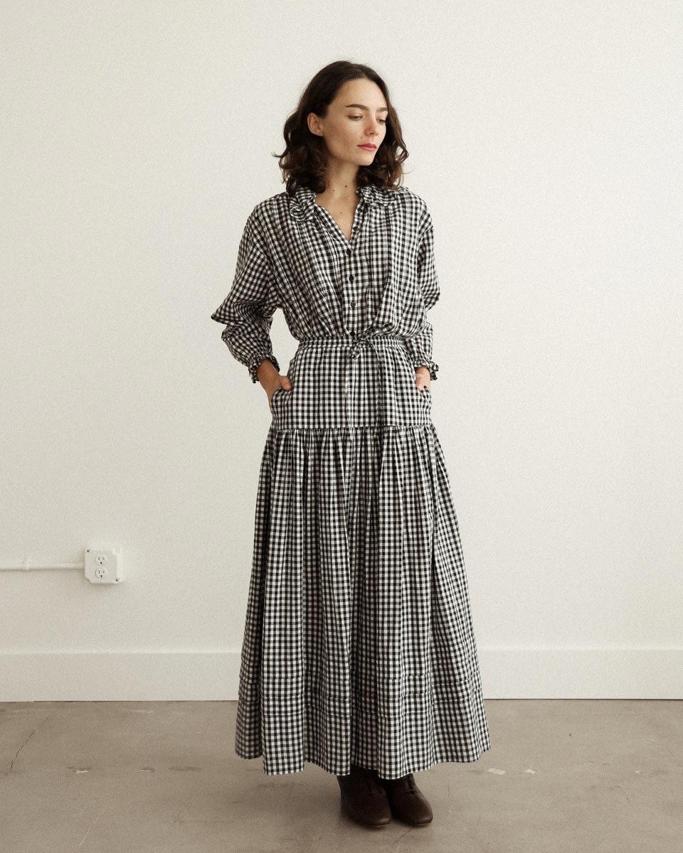 Gardenne Skirt in Prairie Noir — vintage-inspired cotton gingham midi skirt with drawstring waist and pleated hem.