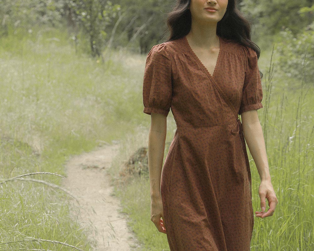 Pemberley Dress in Terre — vintage-inspired cocoa brown cotton wrap midi with lace trim and puff sleeves.